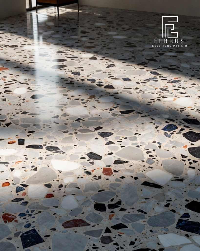 Polished terrazzo flooring in modern interior showing marble and glass aggregates – terrazzo floor maintenance and cleaning guide