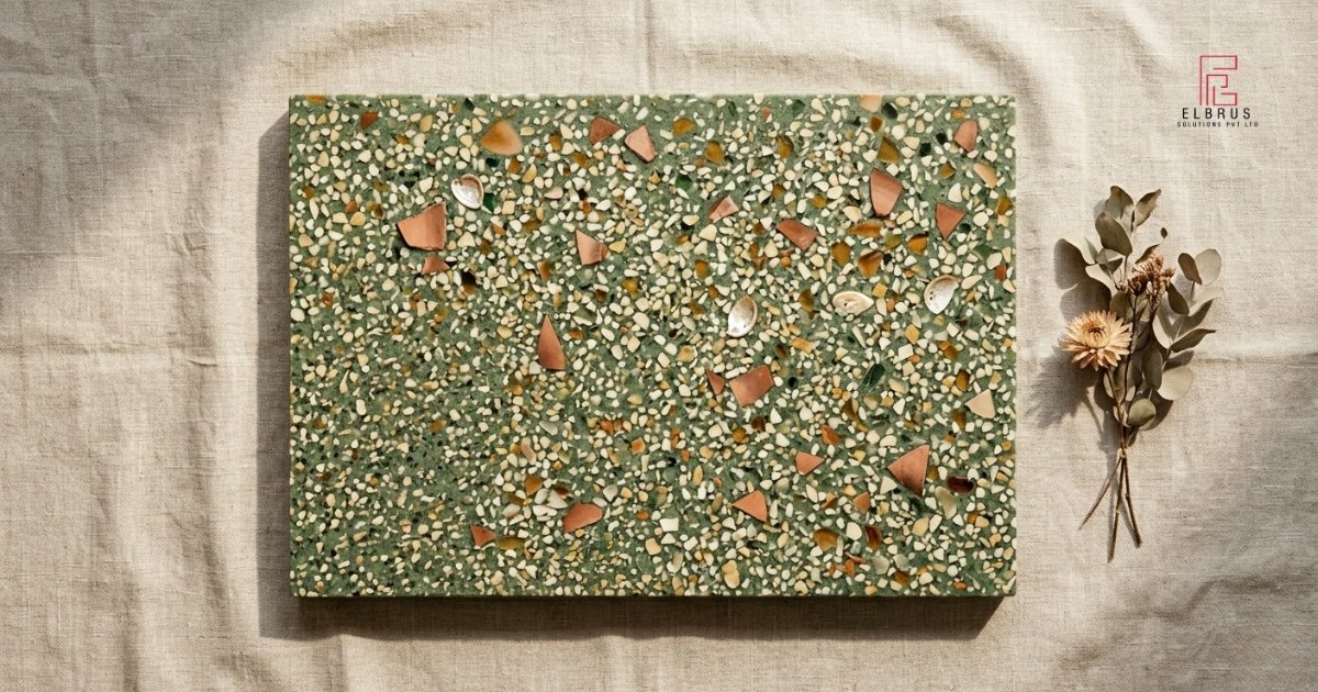 Seamless poured terrazzo luxury wet room bathroom in deep forest green with marble and glass chips — bathroom terrazzo trend 2026